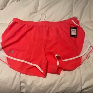 NWT Women’s Under Armour fly by 2.0 shorts. Hot pink in color. Size 3X